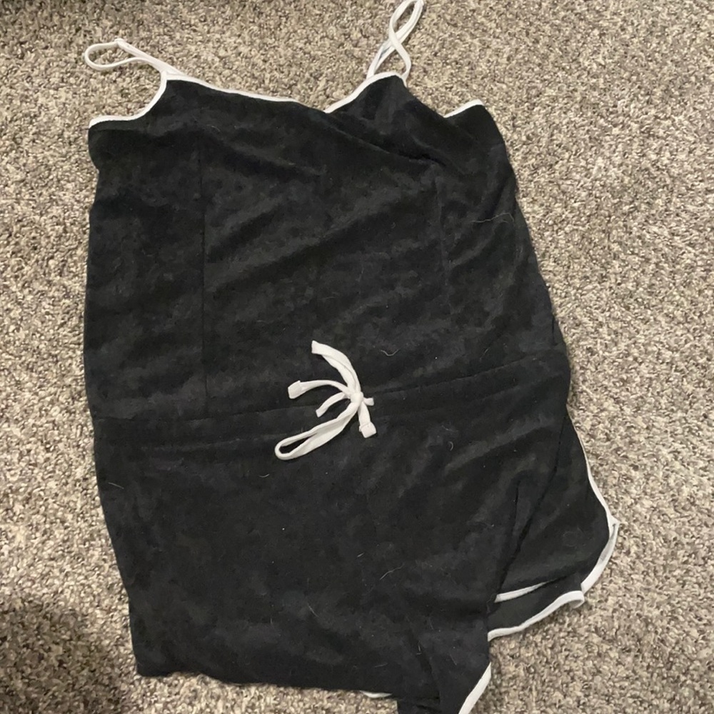 Bathing suit coverup with adjustable middle